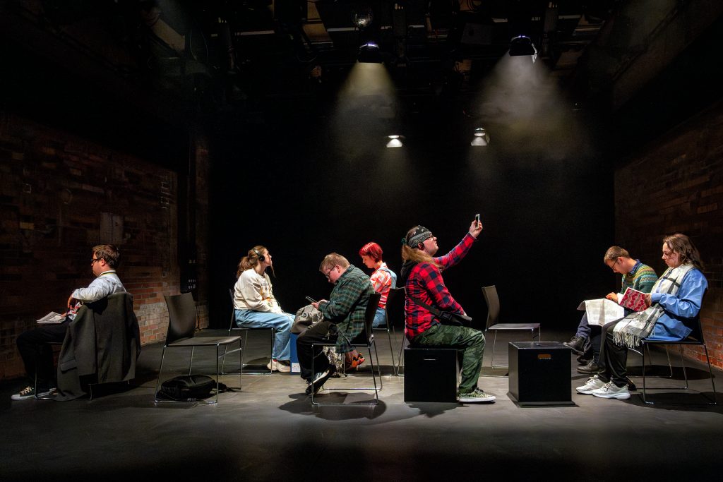 Photo of 7 CARRIAGES with students from Performance Academy on stage