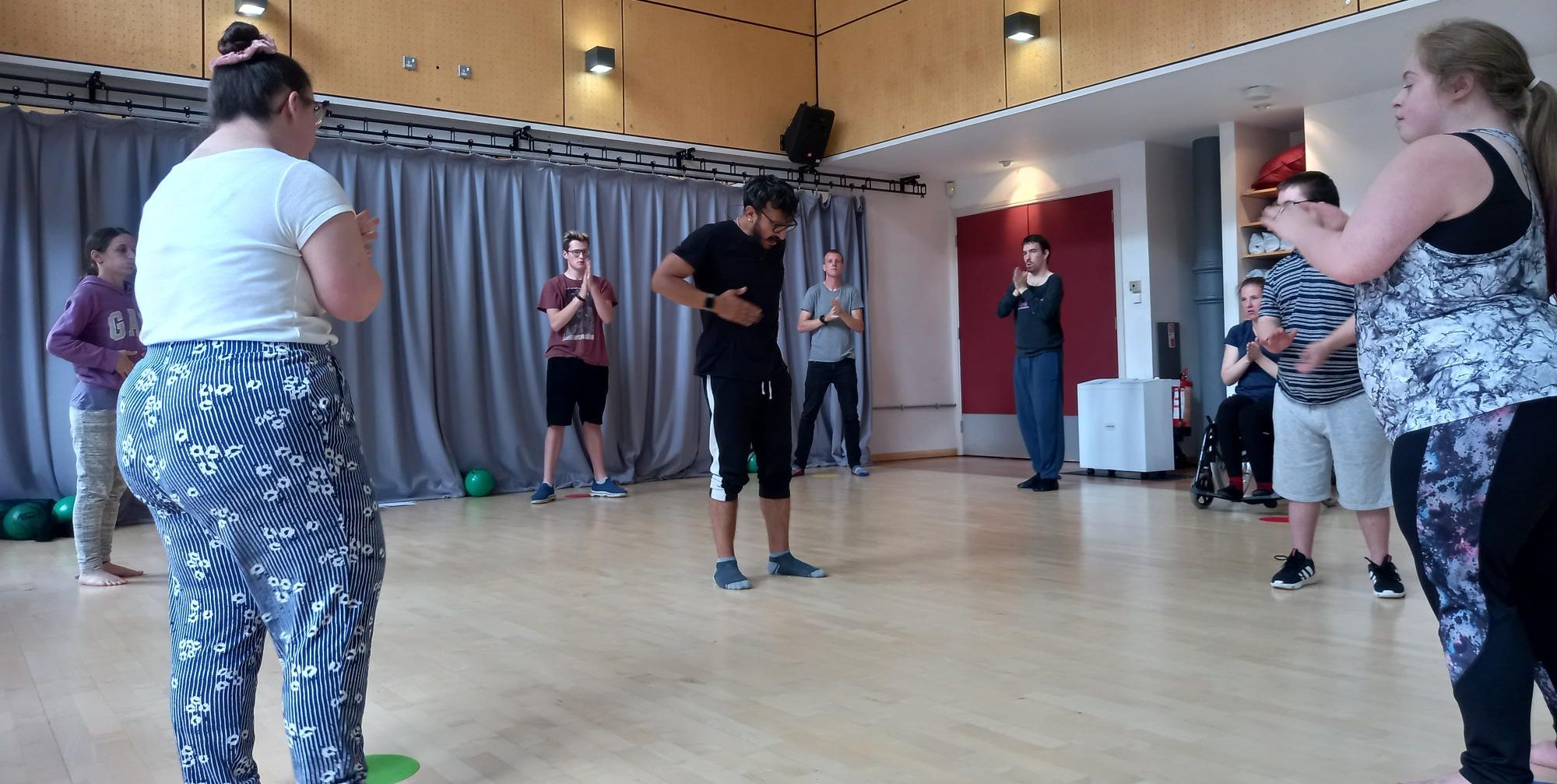 People dancing in a dance studio