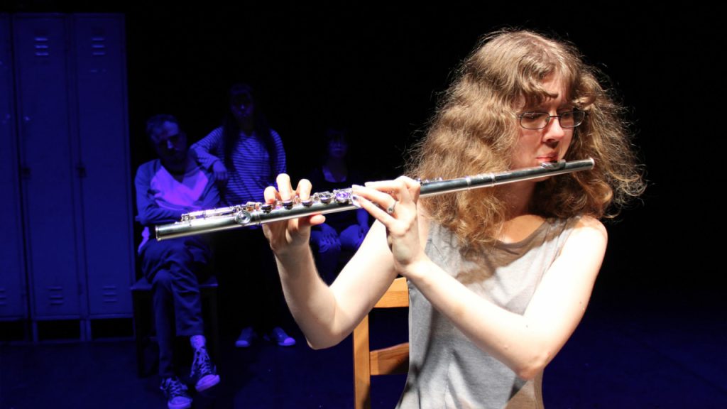 Alisson Colborne plays the flute in Mia